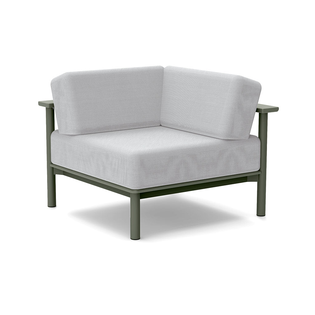 Studio image of a Corner Lounge Chair with Sage frame and Silver cushions.