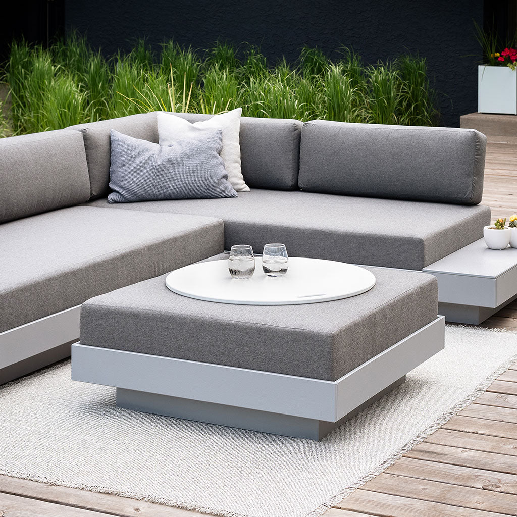 fire ring top used as hard top table on platform one ottoman