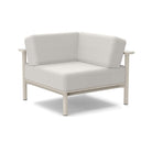 Studio image of a Corner Lounge Chair with Fog frame and Cloud cushions.