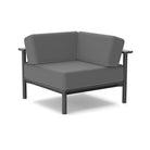 Studio image of a Corner Lounge Chair with Charcoal frame and Charcoal cushions.