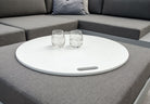Loll fire ring top used as table on platform one ottoman
