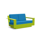 studio shot of nisswa loveseat in leaf green with regatta blue cushion