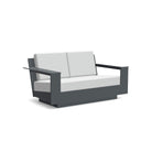 studio shot of nisswa loveseat in charcoal with silver cushion