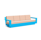 studio shot of nisswa 96 in sky blue with cast petal cushion